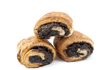 Croissant from flaky pastry with poppy