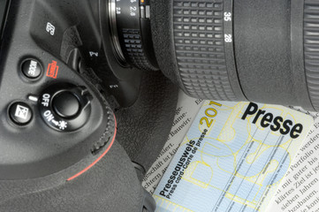 Kamera und Presseausweis