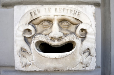 An old mailbox slot in Pisa