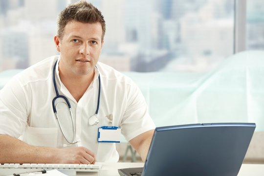 Mid-adult doctor in office