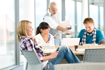 Fototapeta premium High school - three students with professor