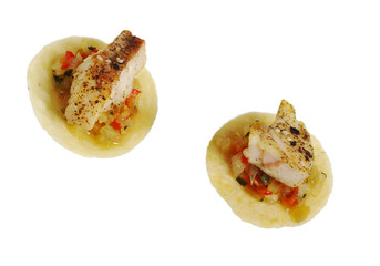 Fish on vegetables and chip isolated on white (Selective Focus)