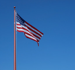 U.S. Flag against a clear blue sky
