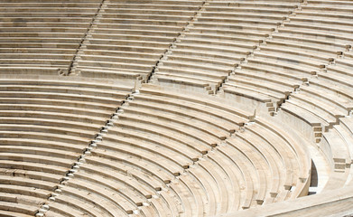 Old stone steps of staircase in ancient amphitheatre