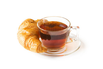 Breakfast concept - croissant and tea isolated on white
