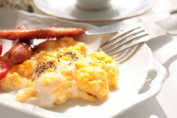 Scrambled egg and sausage breakfast