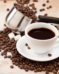 pot, cup of coffee and sugar