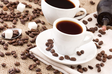 cups of coffee and grinder