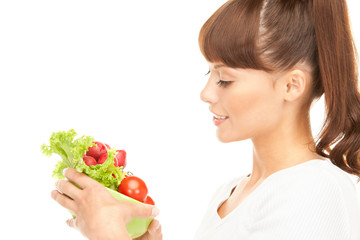 beautiful housewife with vegetables