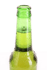 Bottle with beer closeup isolated on white