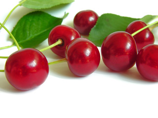 ripe cherries, isolated on white