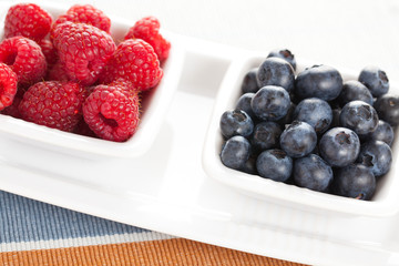blueberries and raspberries in bowl