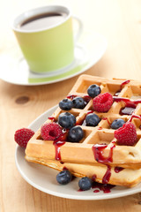 tasty waffle with fruits