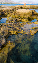Sunset on the Mediterranean Sea. Mountains and a couple in love