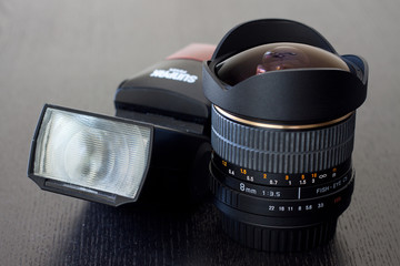 Camera lens and flash
