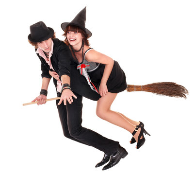 Couple with witch  fly on broom. Isolated.
