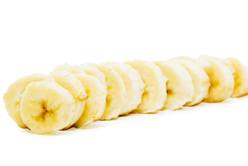 Freshly sliced bananas on a white background
