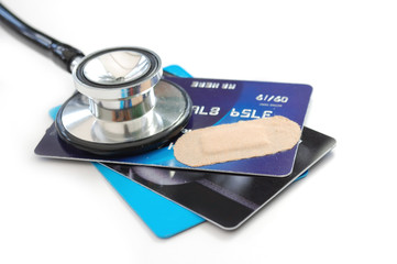 Credit card and stethoscope