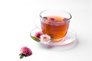 cup of herbal tea with flowers  isolated on white