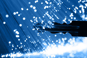 Fiber optics background with lots of light spots