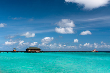 Boat moored at tropical island