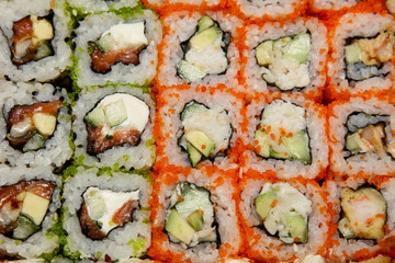 background with different sushi