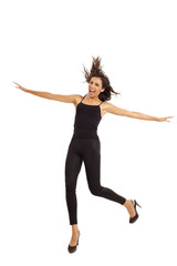 Obraz premium Cute young energetic girl wearing black jumping in air