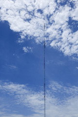 televison mast - cloudy blue sky
