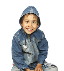 Sitting a little boy in denim jacket