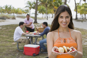 Hispanic friends enjoying barbecue