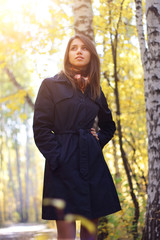 attractive girl in the autumn forest