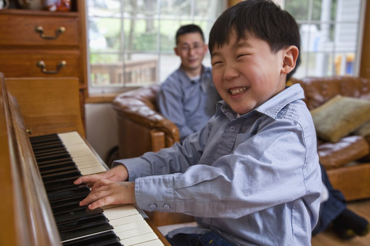 Korean boy playing piano