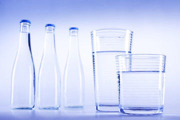 Water glass and bottles