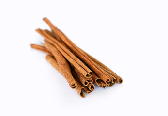 cinnamon sticks on whtie