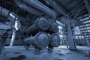Naklejka premium Industrial zone, Steel pipelines in blue tones