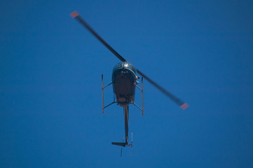 helicopter in blue sky