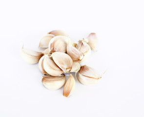 garlic cloves on white background