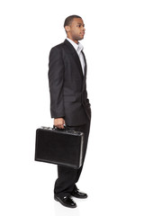African American businessman isolated on white holding briefcase