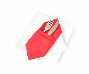 knife and fork in a red napkin