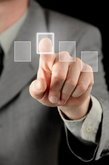 Businessman pressing virtual button