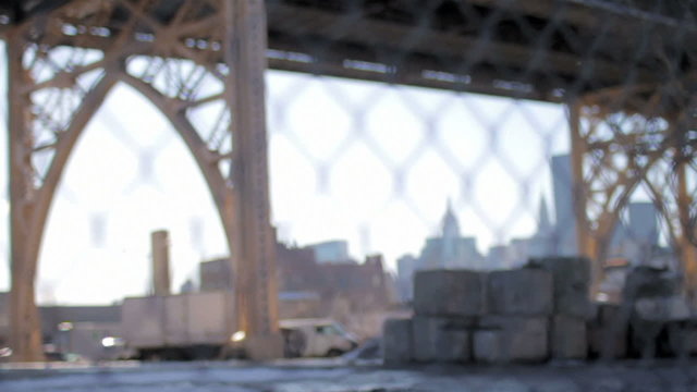 NYC Skyline Through Gritty Fence