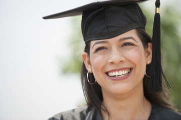 Smiling Hispanic graduate