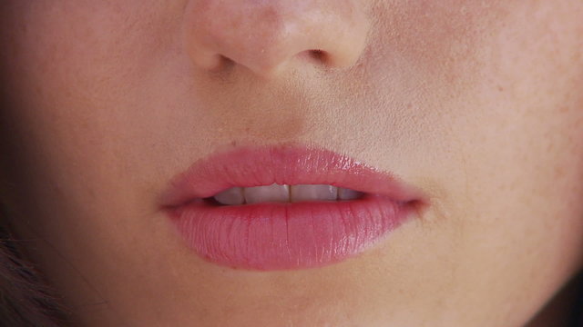 Close up of young woman’s lips