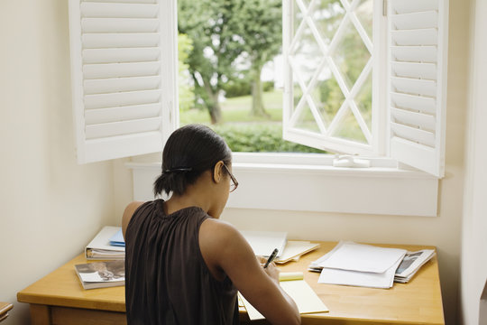 Woman Writing At Desk Images – Browse 148,954 Stock Photos, Vectors
