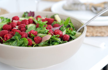 Melon, avocado and chicken salad with raspberries