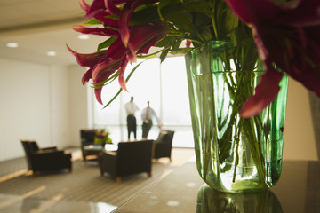 Businessmen having meeting in lobby