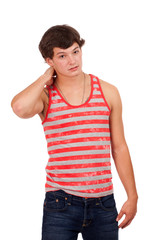 Young man in red and white striped shirt and jeans.