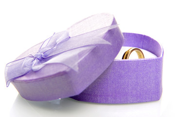 a purple box with a golden ring