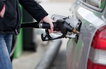 Car fueling at the gas station.