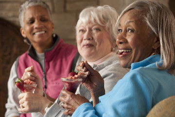 Friends eating dessert in restaurant